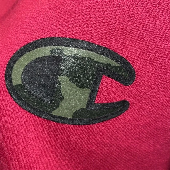 Mens Cozy up with this champion hoodie, cranberry in color with camo writing - Picture 1 of 12